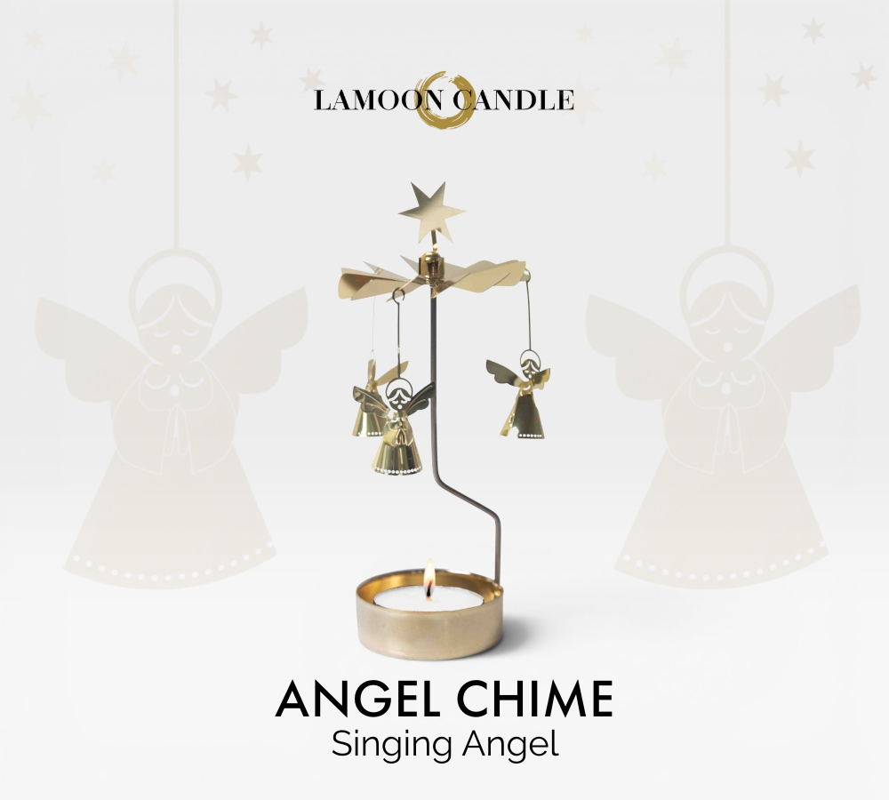 LaMoon Candle gold Singing Angel Chime rotary candle holder with lit tealight spinning on black background