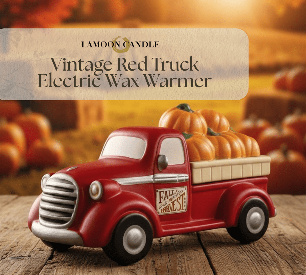 LaMoon Candle 'Vintage Red Truck Electric Wax Warmer' shown as a decorative red pickup truck figurine with pumpkins in the bed, on a wooden surface with a warm autumnal background and product label overlay.