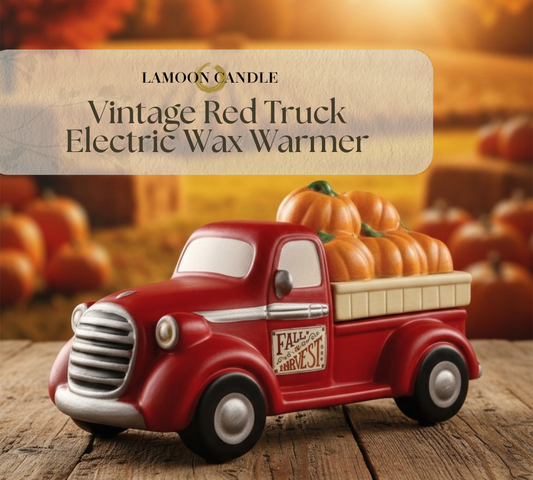 LaMoon Candle 'Vintage Red Truck Electric Wax Warmer' shown as a decorative red pickup truck figurine with pumpkins in the bed, on a wooden surface with a warm autumnal background and product label overlay.