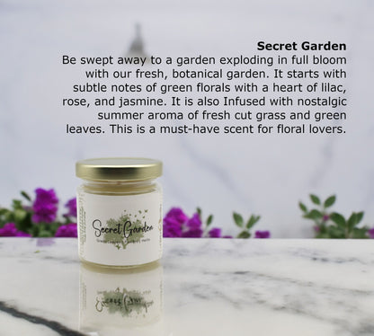 Natural soy wax candle in clear glass container and twist gold lid.