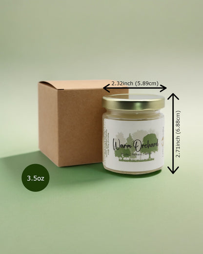 Natural soy wax candle in clear glass container and twist gold lid.