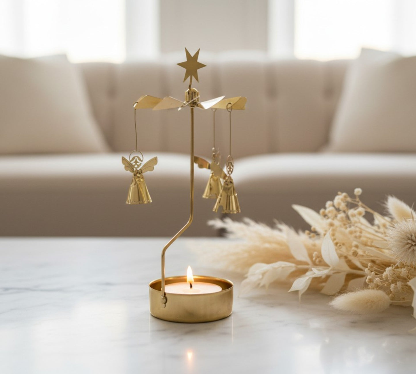 Spinning Angel Chime candle carousel on a table in the living room.