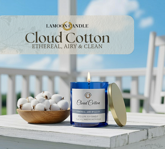 Lamoon Candle Cloud Cotton candle with a bowl of cotton on a wooden surface outdoors.